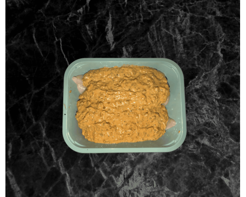 Oven ready chicken fillets covered in a peppercorn sauce